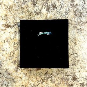 New Sterling silver size 6 ring with little green stones. Very cute